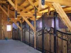 This post and beam barn has had custom built stalls for horses added